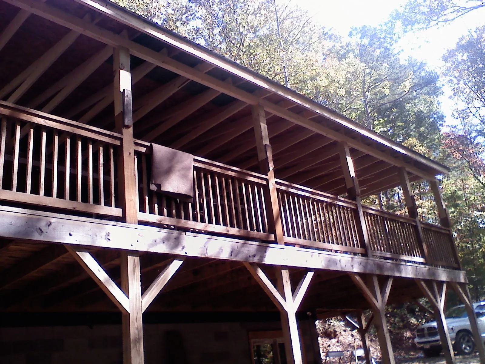 Timber framing under a new elevated porch and deck — Roof Leak Repair in Patuxent River by Roofing Brothers